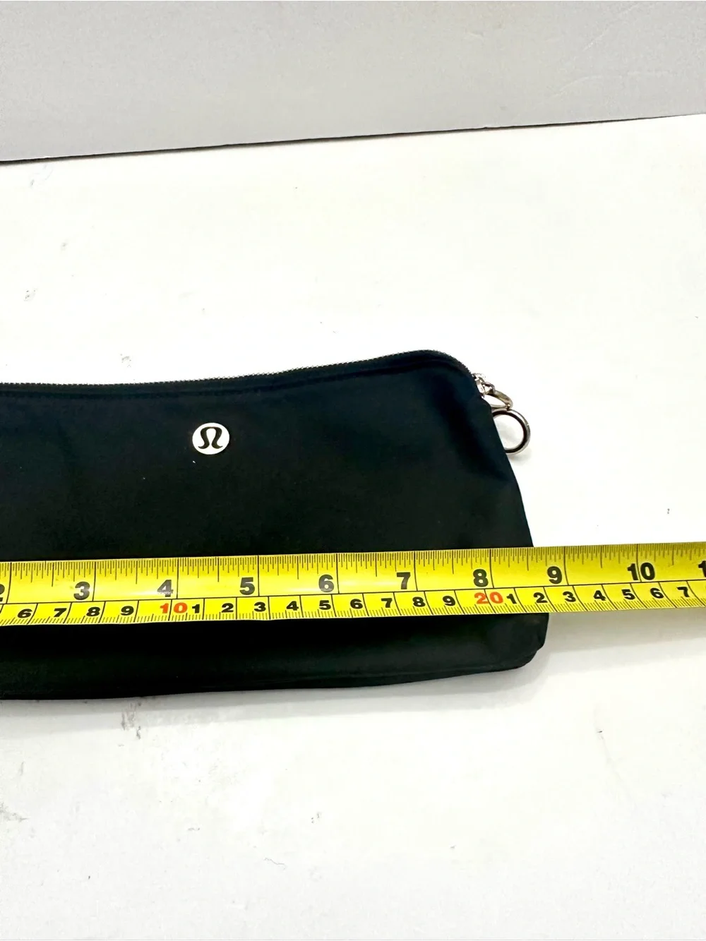 lululemon athletica Black Wristlet Pouch with Gold Logo